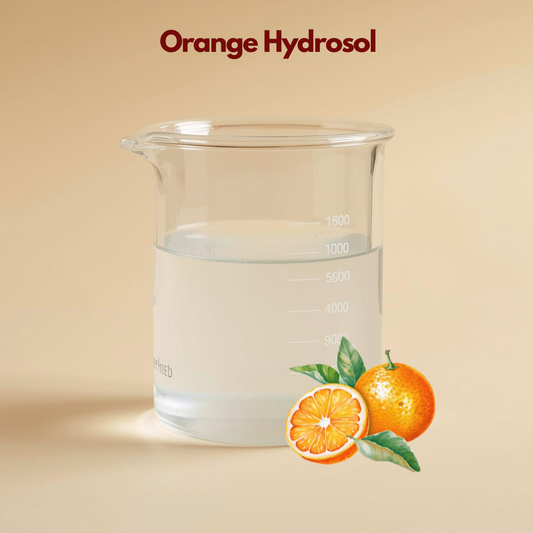 Beaker filled with transparent liquid labeled Orange Hydrosol featuring whole and sliced orange illustrations with green leaves. This orange hydrosol botanical toner suggests refreshing and energizing citrus skincare benefits.