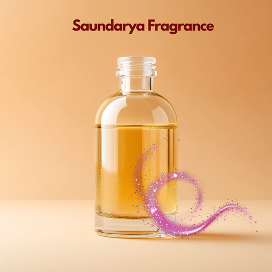 Transparent fragrance bottle labeled Saundarya Fragrance with a soft pink sparkling swirl effect near the base. This oil soluble fragrance for cosmetics suggests an elegant feminine aroma suited for luxury cosmetic formulations.