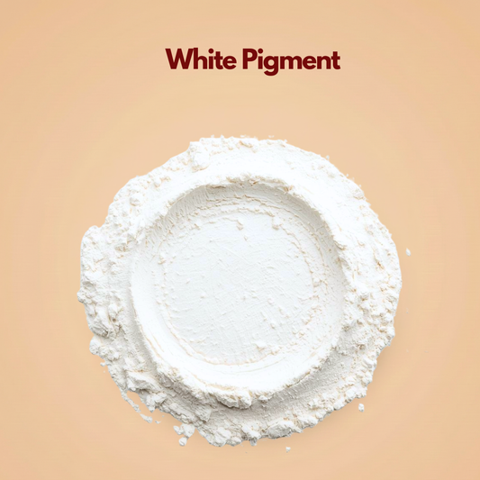 Circular layer of white pigment powder with a smooth pressed center and soft powder fragments around the edge. The texture appears lightweight and finely milled with a clean matte finish. This white cosmetic pigment powder is used for foundation blending, brightening formulations and mineral makeup.