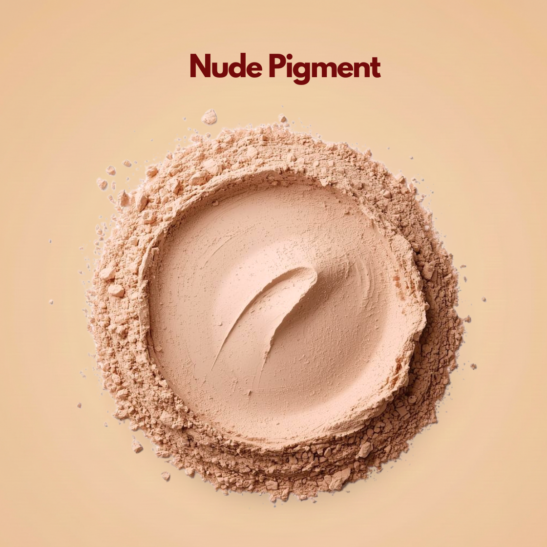 Top view of nude pigment powder arranged in a circular pressed shape with a soft beige skin tone color and scattered loose particles around the perimeter. A subtle swipe mark across the center reveals its smooth and blendable texture. This nude cosmetic pigment powder is commonly used in foundation, concealer and natural makeup formulations.