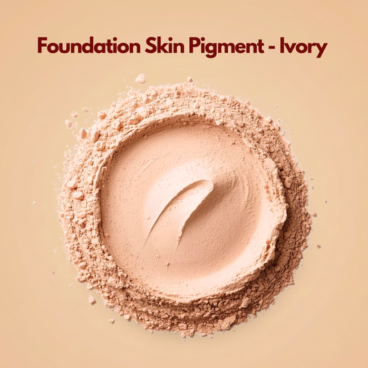 Top view of ivory foundation pigment powder arranged in a circular pressed layer with soft beige undertones and scattered loose particles around the edge. The texture appears smooth and cosmetic grade with a natural matte finish. This foundation skin pigment powder is designed for creating light shade makeup and base formulations.