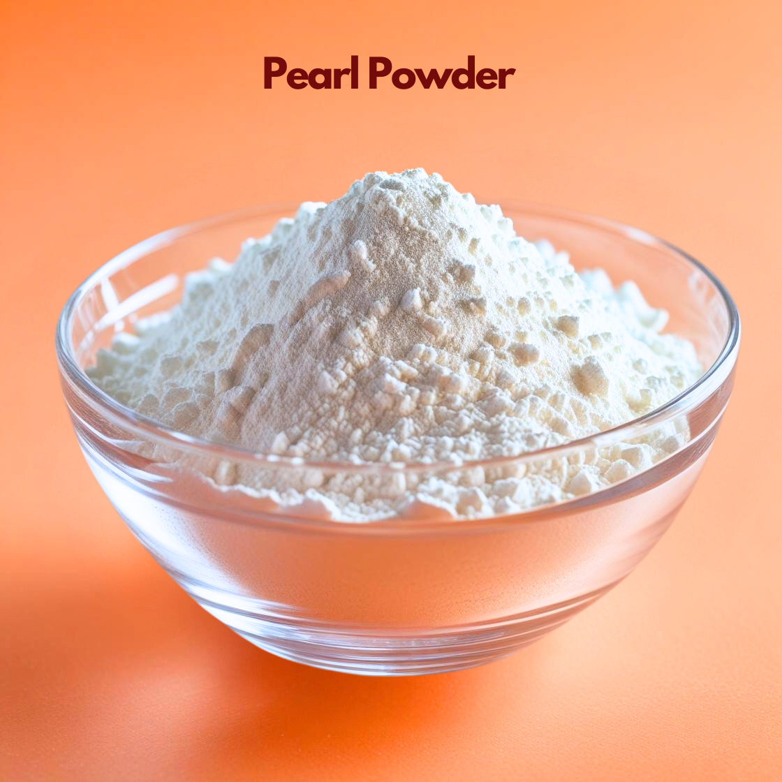 Transparent bowl filled with fine white pearl powder labeled Pearl Powder placed on a bright orange background. Pearl powder is a traditional cosmetic ingredient used in skincare formulations for skin brightening smooth texture and radiant complexion.