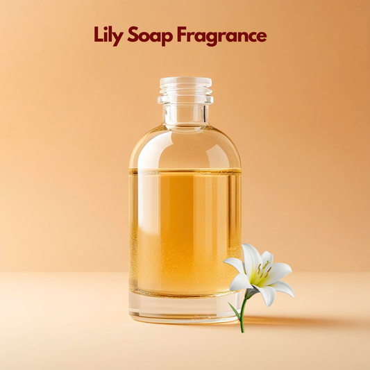 Transparent bottle containing "Lily Soap Fragrance" with white lily flower beside it, floral soap fragrance used in soap making, skincare products and personal care formulations.
