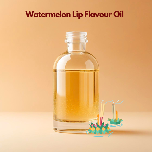 A clear glass bottle filled with a golden liquid labeled 'Watermelon Lip Flavour Oil', placed on a soft beige backdrop.