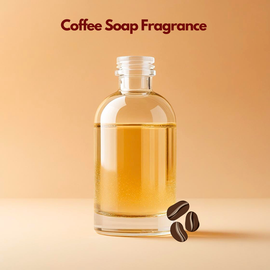 A transparent bottle filled with golden liquid labeled "Coffee Soap Fragrance" sits against a warm beige background, with three illustrated coffee beans nearby.