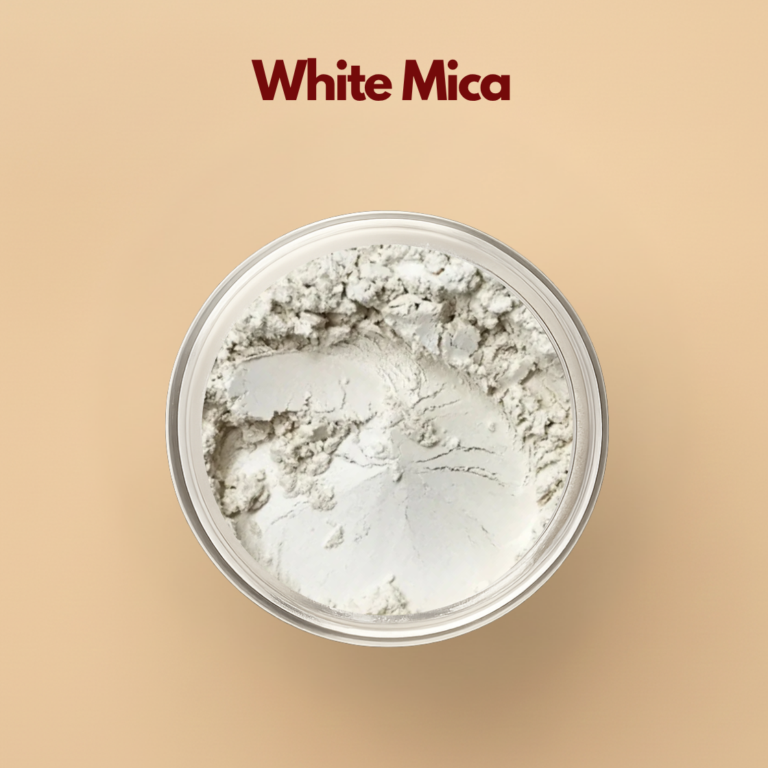 Close up of white mica powder in a round container, showing a soft off white shimmer with a fine silky mineral texture. The surface appears lightly pressed with delicate reflective particles throughout. This white mica powder for cosmetics is commonly used in highlighters, foundation blending and illuminating beauty formulations.