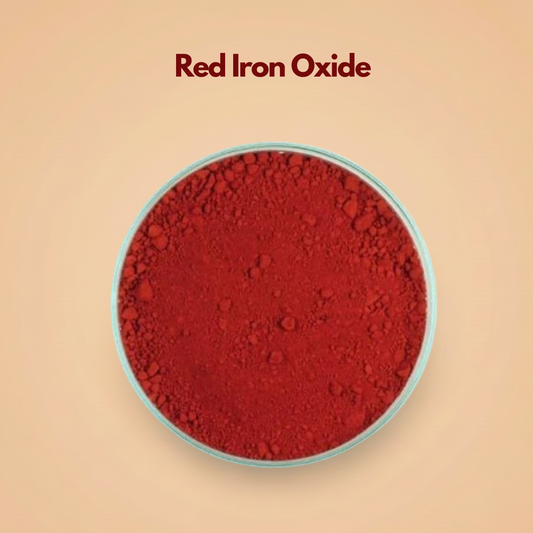 Close up top view of red iron oxide pigment powder inside a round container, displaying a deep earthy red tone with a smooth but slightly textured mineral surface. The powder looks finely ground with subtle variations in density. This red iron oxide cosmetic pigment is widely used in foundation, blush and lipstick formulations.