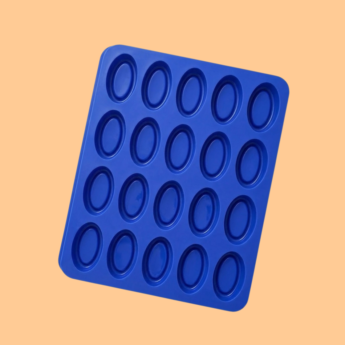 Blue silicone soap mould tray with multiple small 15 oval cavities arranged in grid pattern, mold designed for mini soap bars, guest soaps, DIY soap crafting and cosmetic sample soap manufacturing.