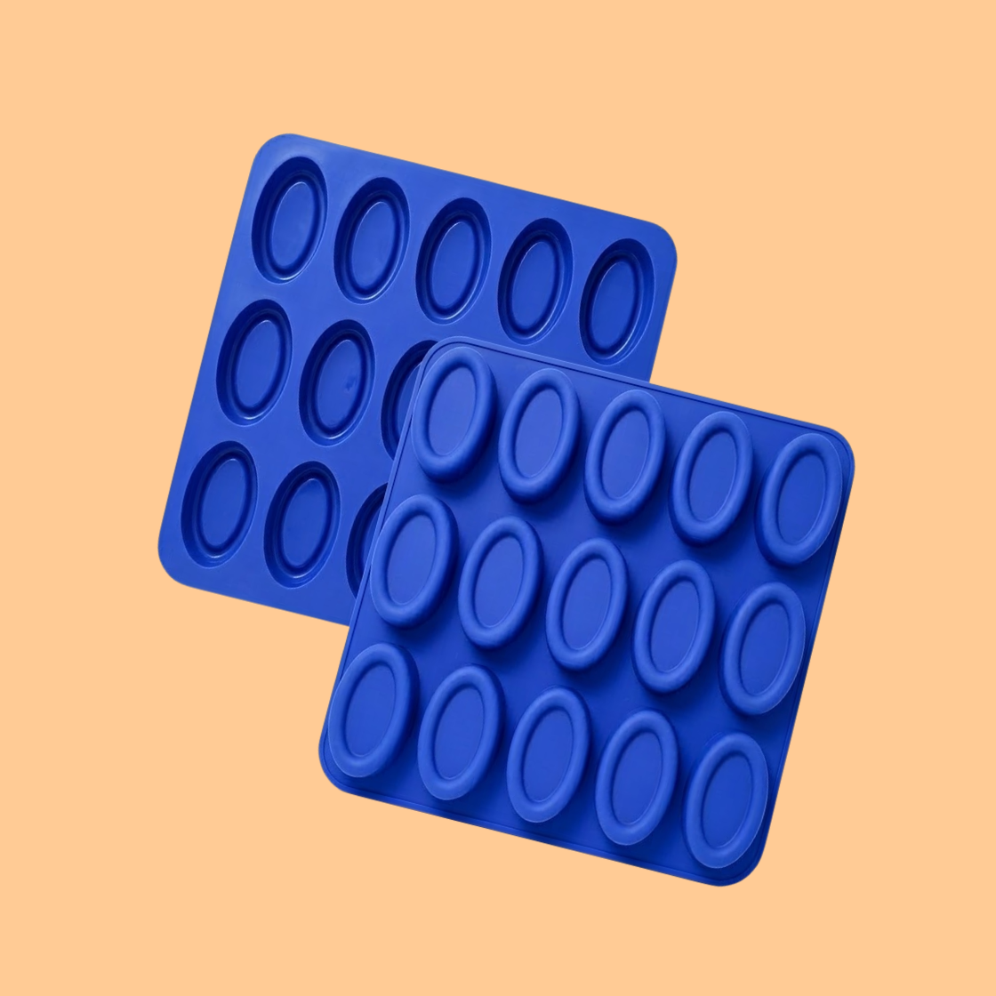  Two blue silicone mini soap mould trays showing cavity side and finished soap side with multiple small oval soap shapes, reusable mold used for handmade soap making, sample soaps, and cosmetic product crafting.