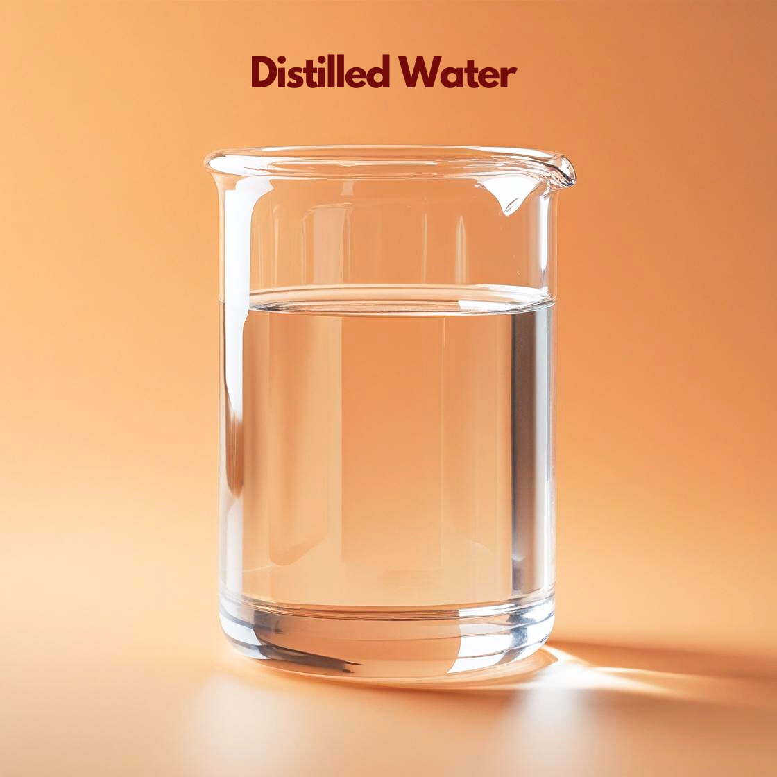 Pure distilled water in clear glass beaker, premium solvent raw material for cosmetic creams and lotions |B2B supplier India.