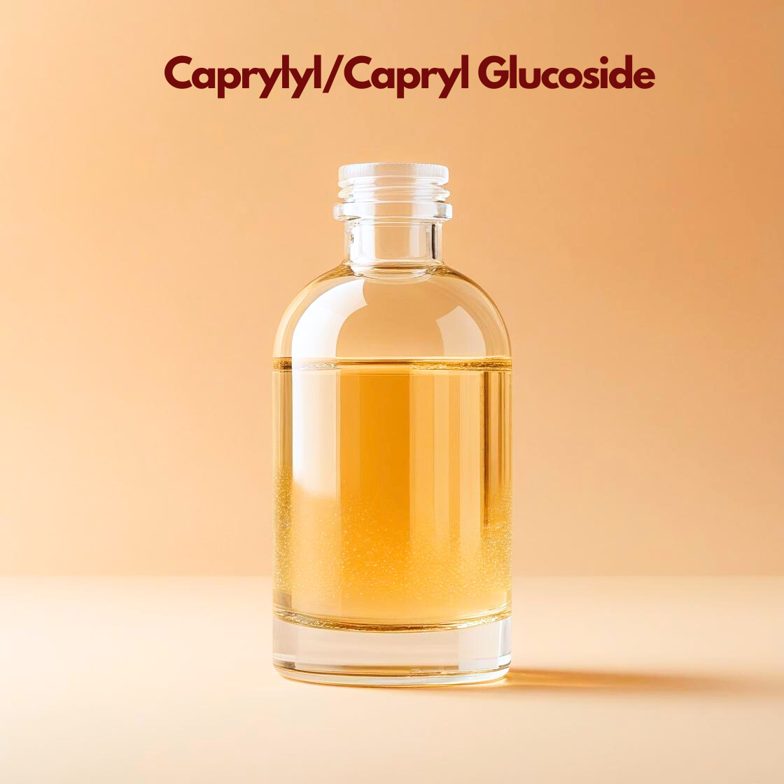 Clear glass bottle containing golden liquid labeled Caprylyl Capryl Glucoside on a neutral background. Non ionic surfactant and solubilizer used in natural cleansers and cosmetic formulations for effective yet mild cleansing.