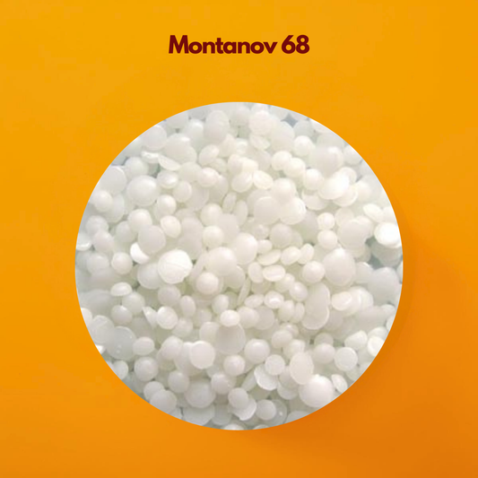 Circular close up of small white spherical pellets labeled Montanov 68 placed on a bright orange background. Montanov 68 is a natural cosmetic emulsifier used in skincare formulations to create stable creams lotions and moisturizing emulsions.