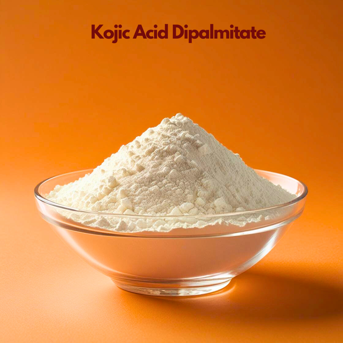 A clear glass bowl filled with Kojic Acid Dipalmitate powder. The powder is cream colored and has a slightly denser, more clumped texture than standard Kojic Acid. It is placed against a solid orange background with the product name centered at the top in maroon.
