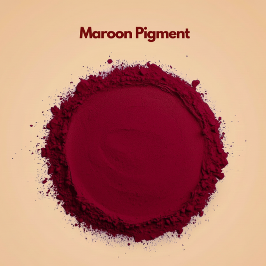 Round formation of deep maroon pigment powder with a dense matte center and softly scattered loose particles along the outer ring. The surface appears finely milled with a bold wine toned intensity. This maroon cosmetic pigment powder is used in lipstick, eye shadow and professional makeup formulations.