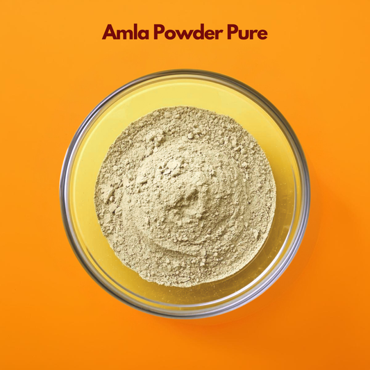 Pure Amla powder in a glass bowl on orange background, natural Ayurvedic herbal powder for hair growth, scalp care, DIY hair masks, vitamin C rich Indian gooseberry powder used in skincare, cosmetic formulations, and herbal beauty products.