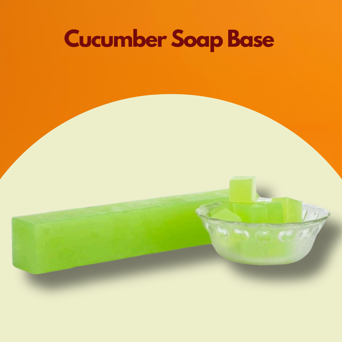  Image showing Cucumber Soap Base text at the top with a translucent green soap block and small cut cubes placed in a clear glass bowl against an orange and beige background. This cucumber melt and pour soap base highlights its fresh green color and ready to use format for handmade soap making.