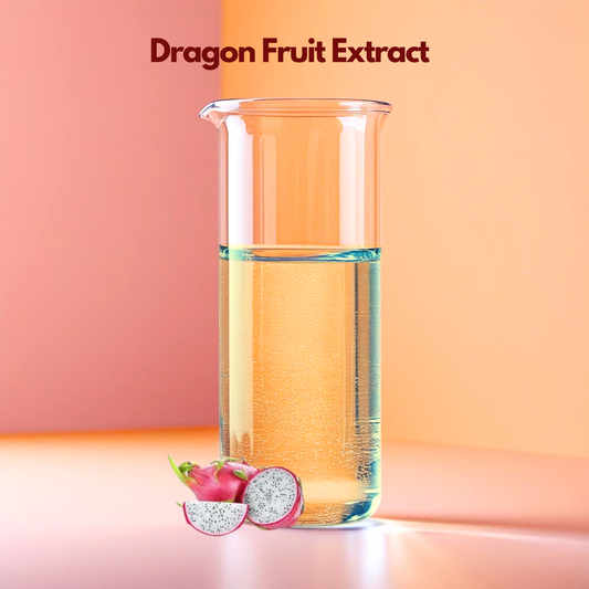 A digital graphic for "Dragon Fruit Extract" featuring the product name at the top in dark maroon text. The image showcases a whole, vibrant pink dragon fruit with green tipped scales next to a circular cross section slice. The slice reveals stark white flesh densely speckled with tiny, black edible seeds. Two green leaves float in the background against a clean, light beige surface with soft shadows.