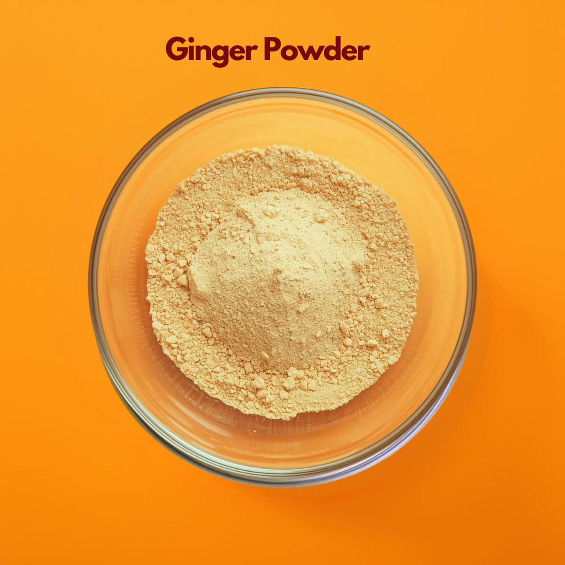 Ginger powder displayed in a clear bowl as a light beige finely ground herbal powder for skincare and hair care with the label Ginger Powder on an orange background. This image highlights a natural herbal ingredient widely used in cosmetic formulations for scalp stimulation improving blood circulation promoting hair growth and supporting acne care in skincare routines.