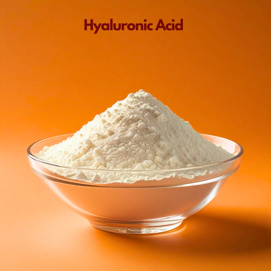 A clear glass bowl containing a tall mound of Hyaluronic Acid powder. The powder is a stark, clean white with a very fine, lightweight texture. The bowl is centered on a bold, solid orange background. The product name "Hyaluronic Acid" appears at the top in a professional maroon typeface.